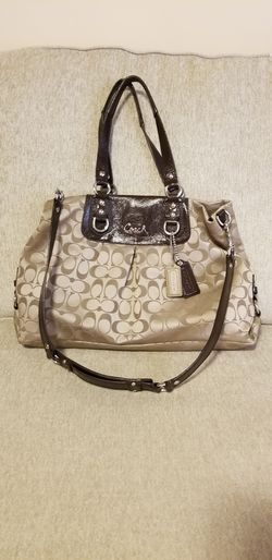 Coach satchel cross body with Coach logo in brown