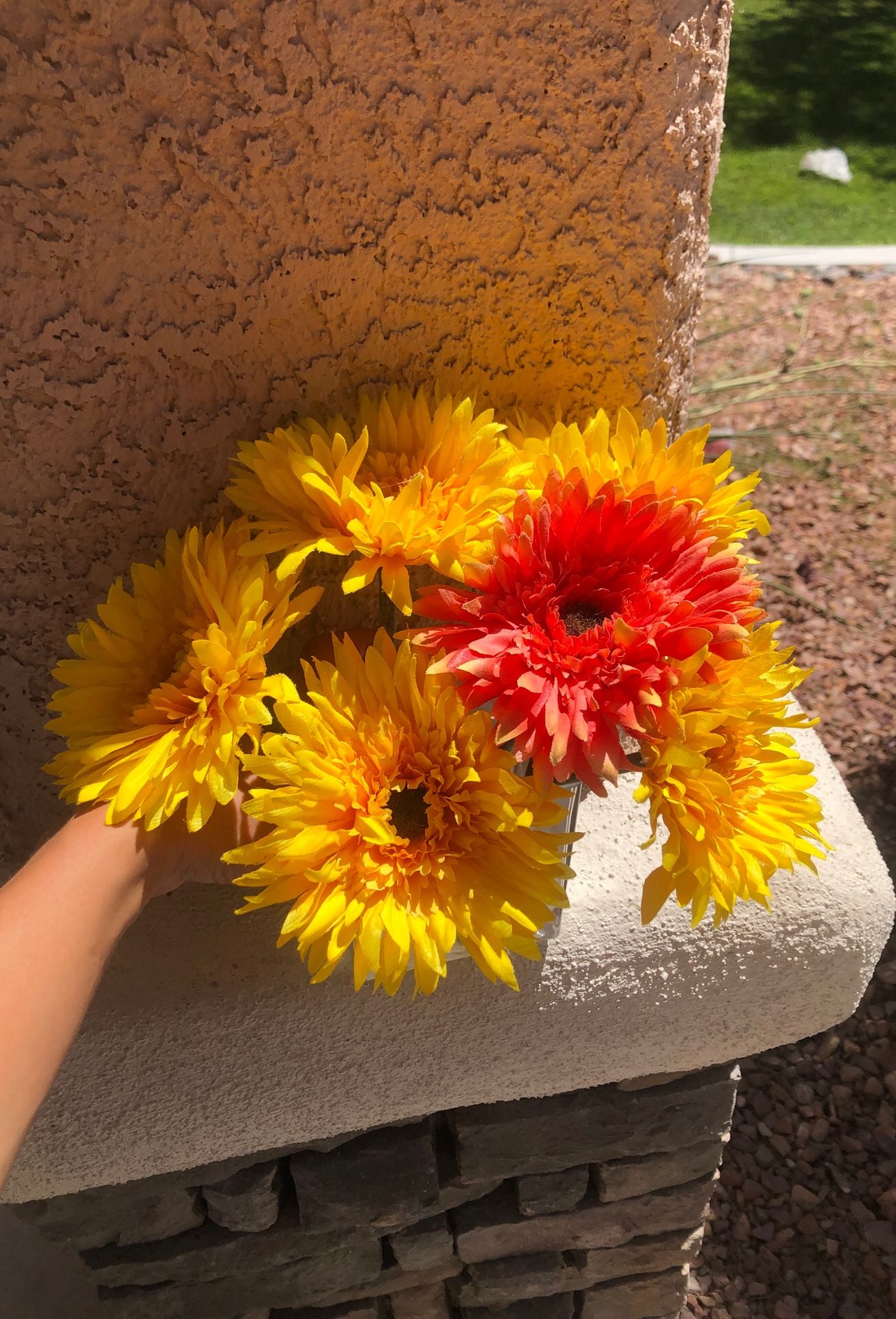 Artificial flowers with clear vase