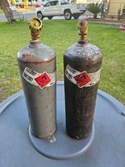 2 used Acetylene Bottles