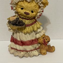 Small resin teddy bear figurine.  