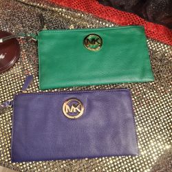 Michael Kors Leather Clutch Zip. New. Choice $65.