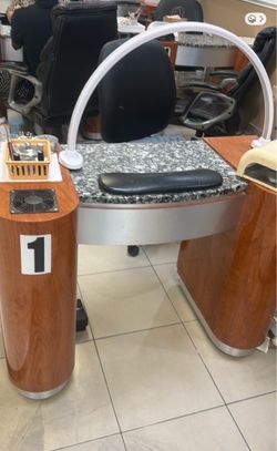 4 nail tables and a reception desk