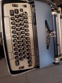VINTAGE TYPE WRITER WITH ORIGINAL PAPERS