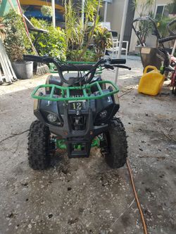 Kids four wheeler with no battery for parts or repair