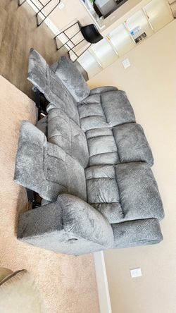 Gray Fabric Reclining Sofa and twin and queen bed with mattresses