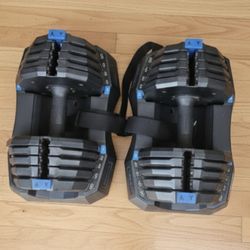 Adjustable dumbells