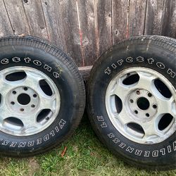 Nice   Who’s fire stone tires with rims  P265  / 70   R  16