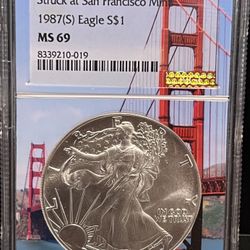 1987 S American Silver Eagle (ASE) • Struck at San Francisco Mint • Golden Gate Bridge Slab Core Label • 1 oz Fine Silver • Graded NGC MS69