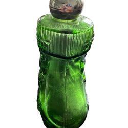 Vintage Avon Empty Perfume Bottle Christmas Stocking  This vintage Avon perfume bottle stocking is the perfect addition to your Christmas decorations.