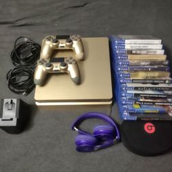 Gold Slim Ps4 1Tb, 2 controllers w 2 10ft cords, nyko charging dock, Beats solo headphones and 13+ games