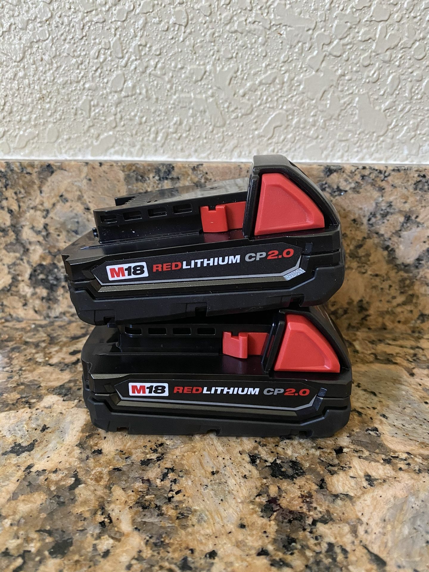 2 Milwaukee M18 Batteries