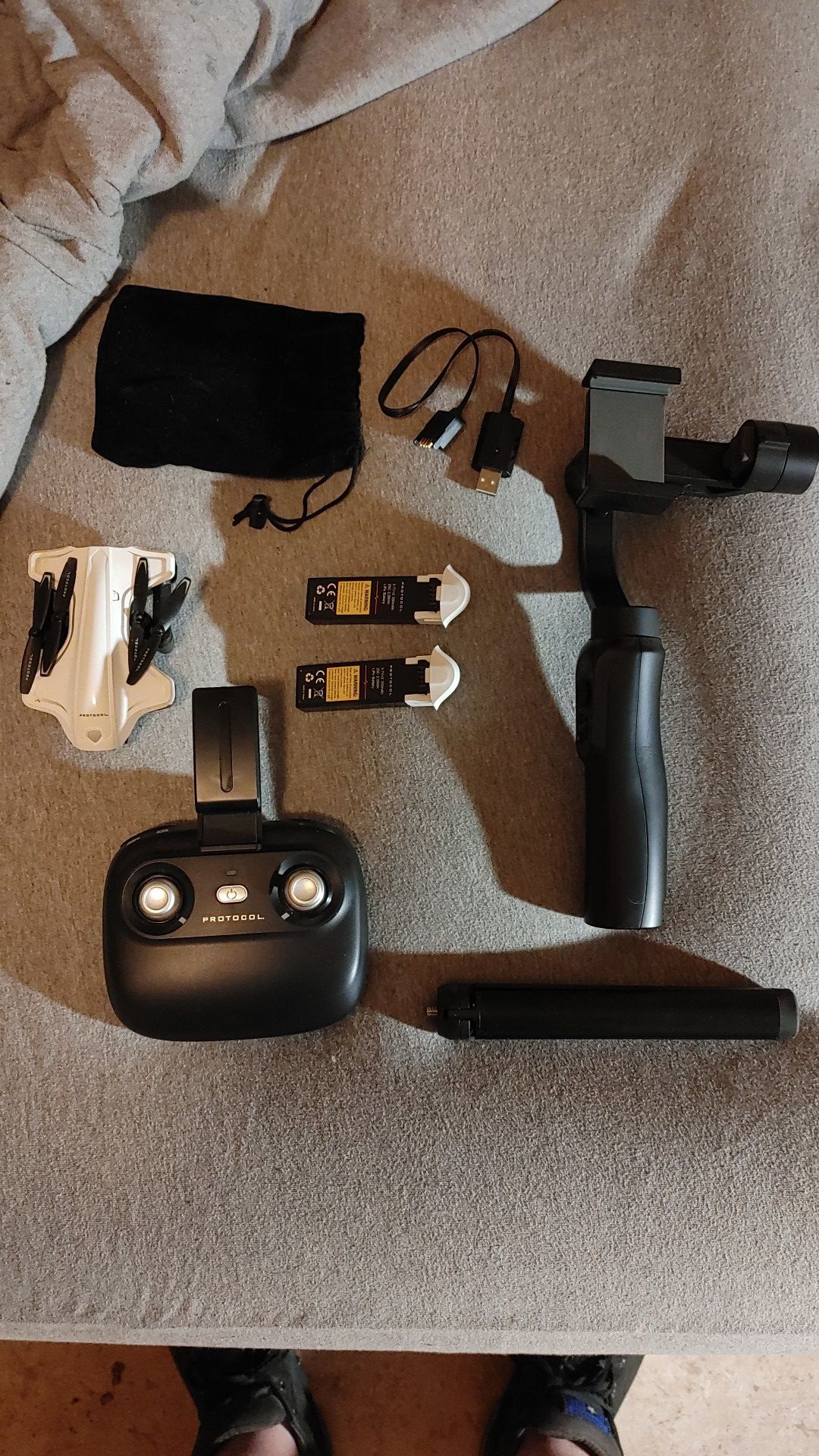Protocol drone with batteries/carrying case and smart phone gimbal with stand