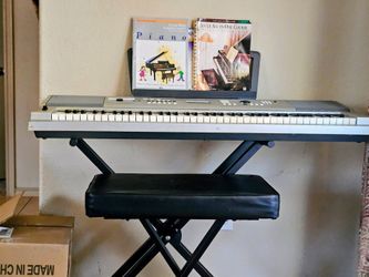 Yamaha Portable Grand DGX-230 Keyboard