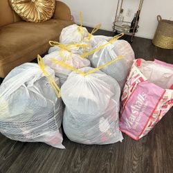 bags of women’s cute clothes 