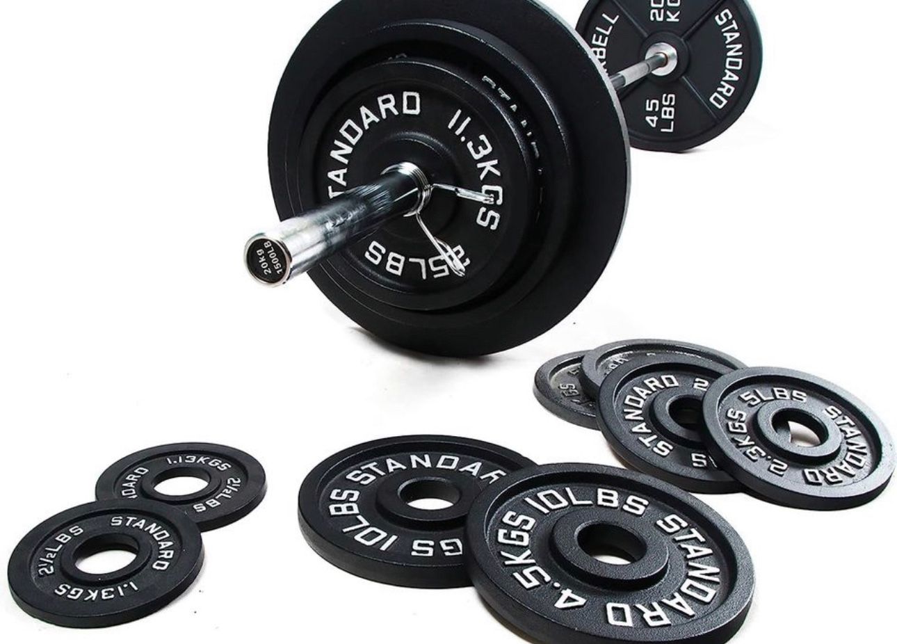Olympic cast iron weight plate set 245 lbs plus 45 lb Bar