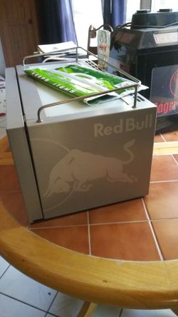 Red bull lighted bar cooler and jaeger meister on tap. Both working refridgerated and lit