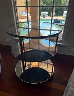 Mercury 3 tier glass table - new price $2,500, our price…