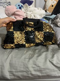 Black and gold sequin purse