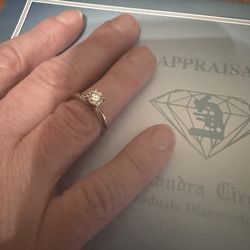 Wedding ring - .59 carat, 14k white gold, Size 5. All offers will be considered. 