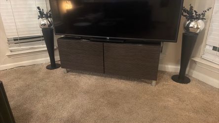 Single stacked shelf or tv stand or storage unit with black glass  top