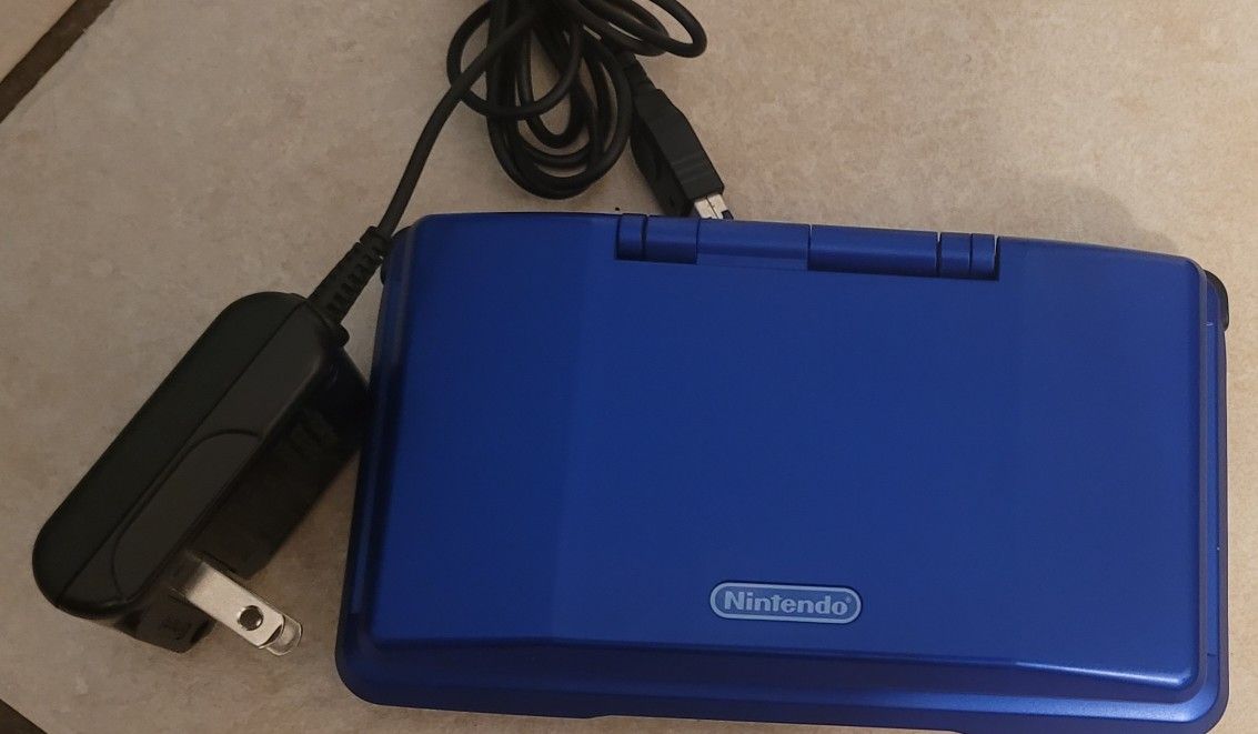 NINTENDO DS FLIP + CHARGER