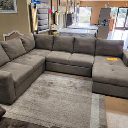 Sectional Sleeper With Storage !! Come See It 