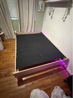 Tan full sized bed frame