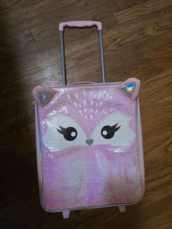 Plushes and suitcase