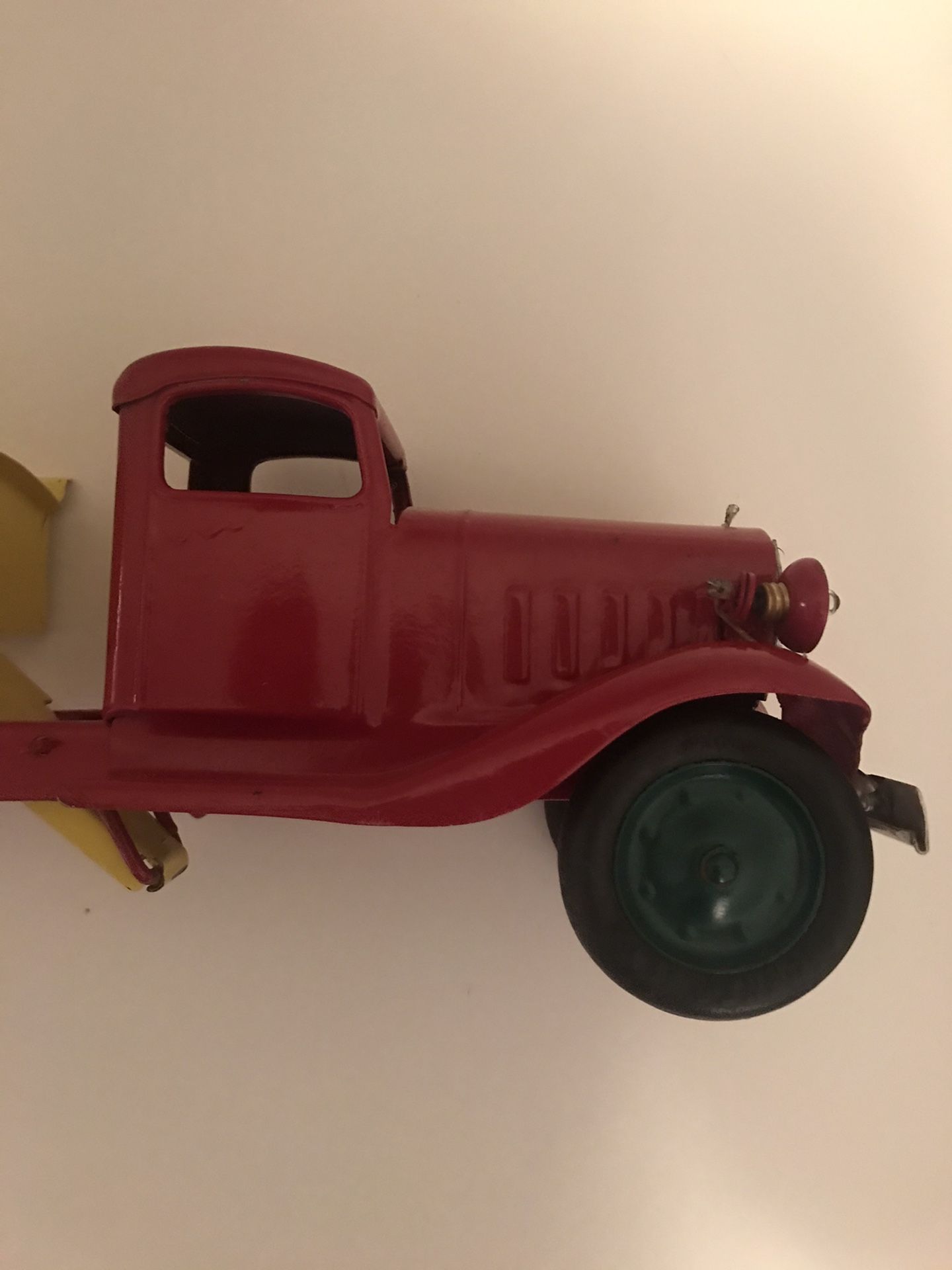 Vintage and Rare Turner Toys Pressed Metal Red and Yellow Dump Truck with Battery Slot for Working Headlights 18in Length 6in Height Normal Wear Rubb