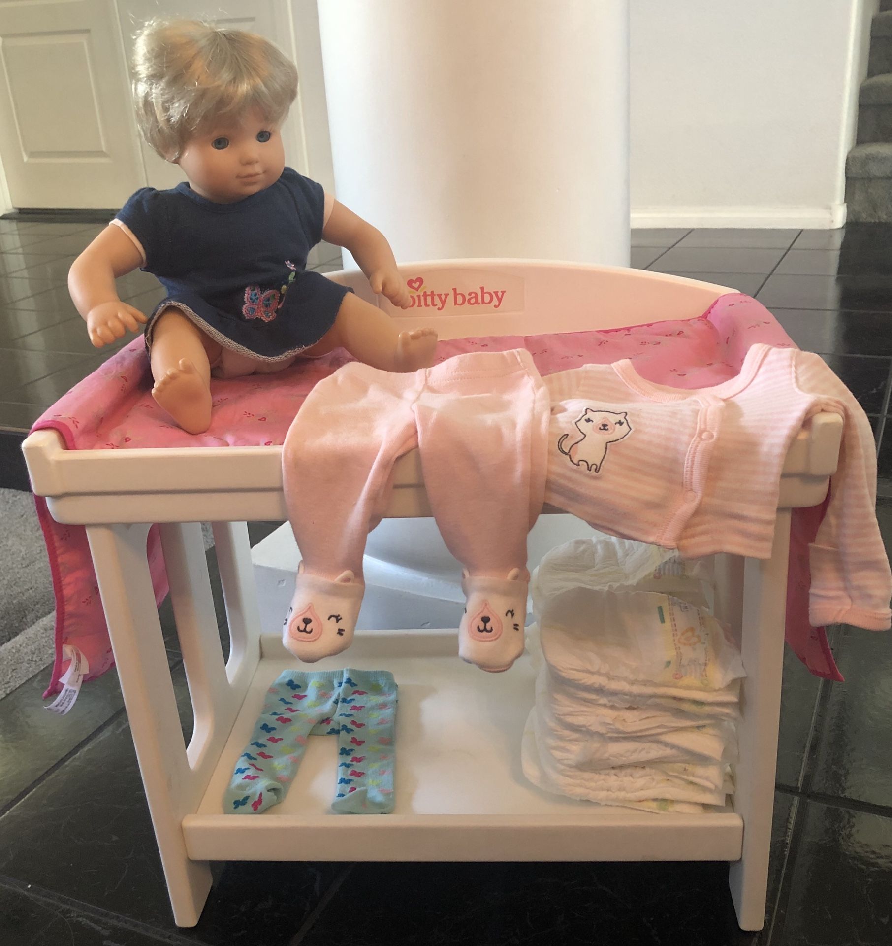 Itty Bitty Baby Doll with changing table, clothes & diapers