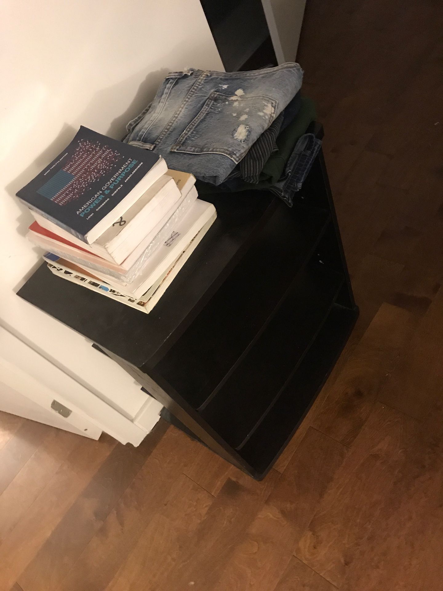 Free stuff small entertainment/tv stand books and clothes.