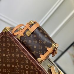 Small L-V handbag.