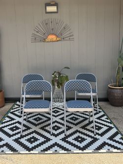 Vintage Meco padded Folding Chairs Set of 4 .