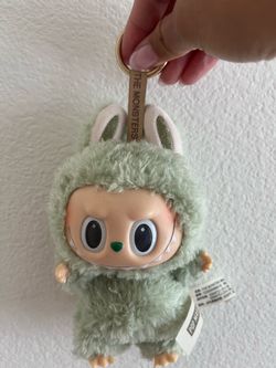 Green labubu