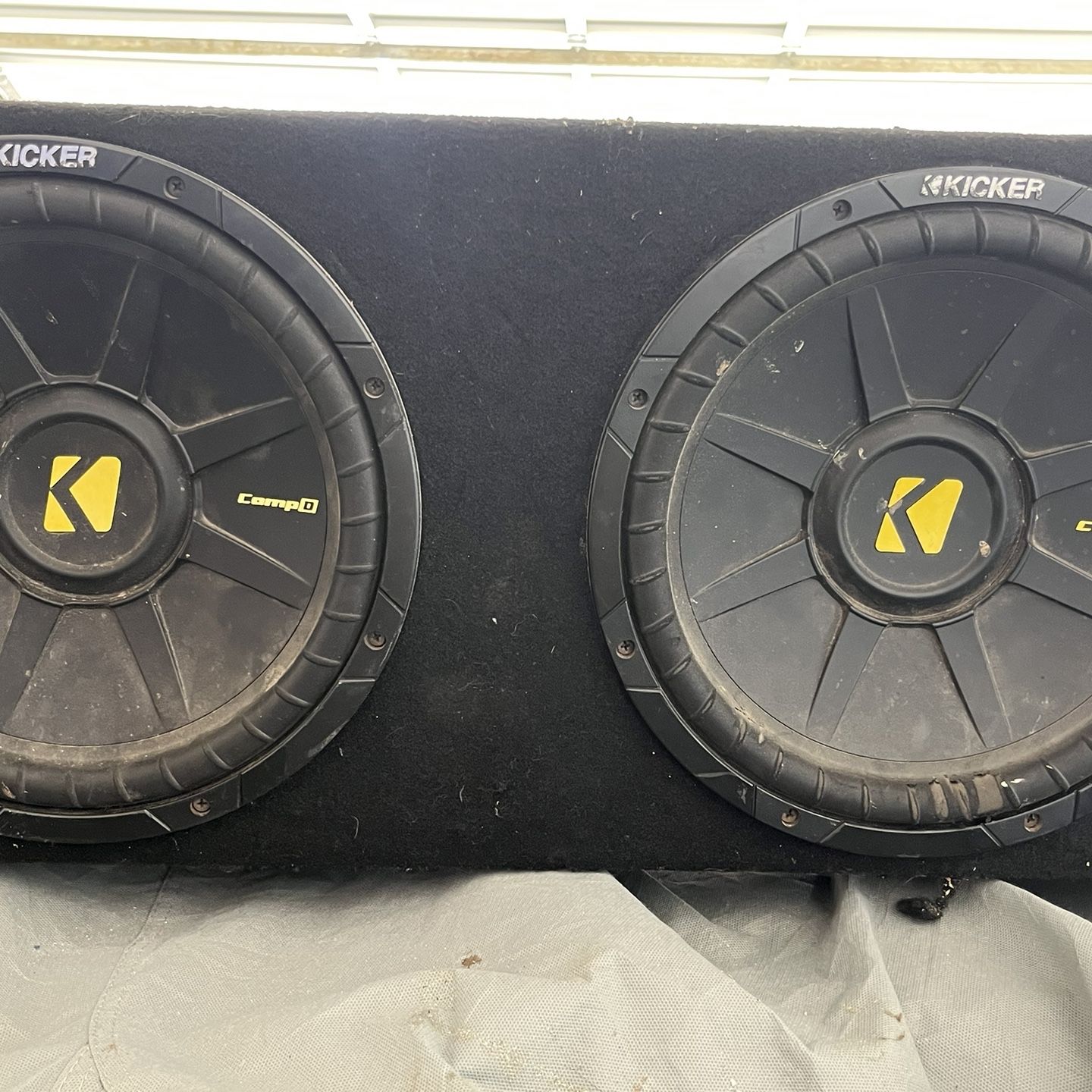 Two 12 Inch Kicker Subwoofers And Amp