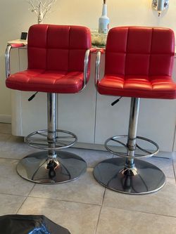 Pair of red bar stools