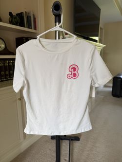 Barbie-themed pink t-shirt