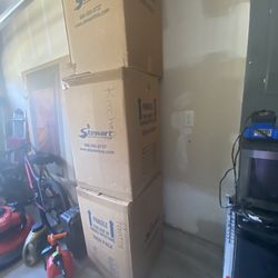 Moving boxes and paper in multiple sizes for sale.