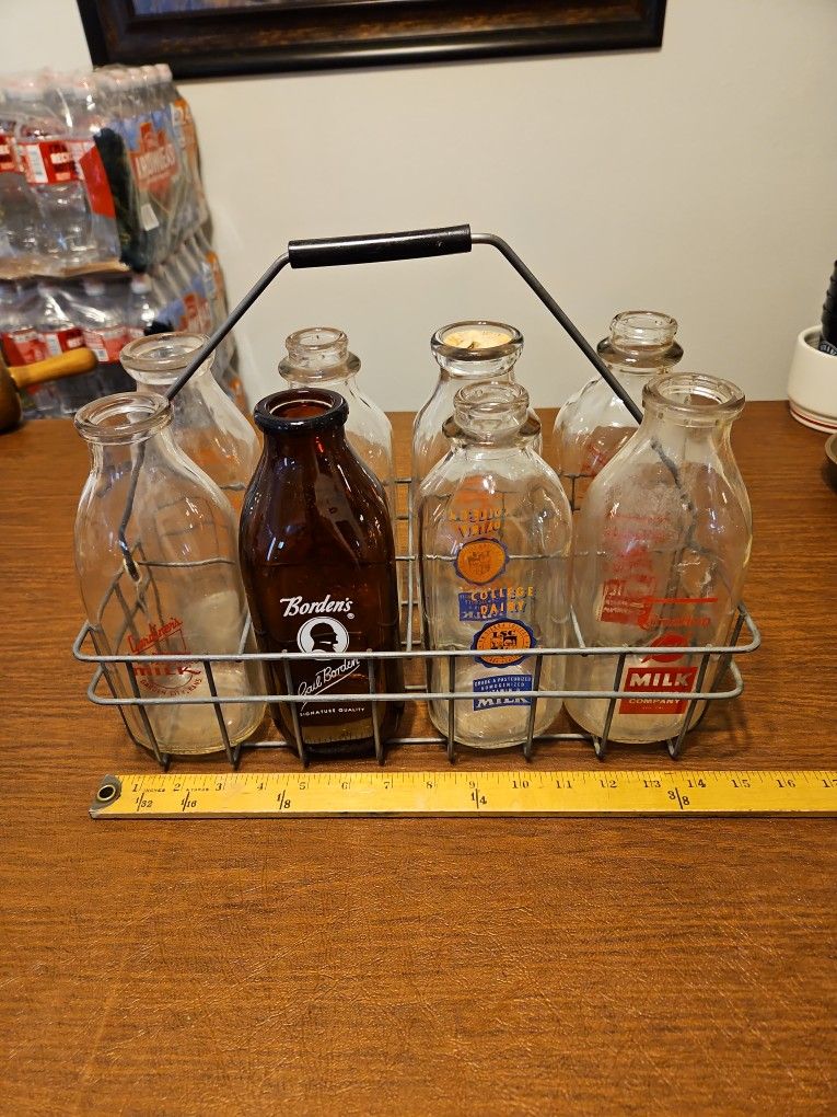 8 Wire Rack Of Assorted Old Milk Bottles
