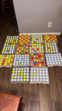 Golf balls over 400  . Some are colored, you choose $ 1 each