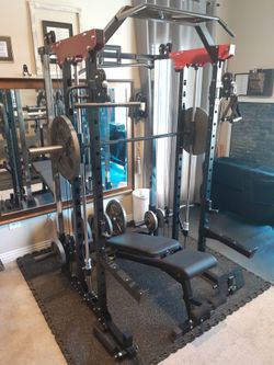 Home Gym > Smith Machine - Dual Cable Pulleys - 335 LBS Olympic Plate Weight Set