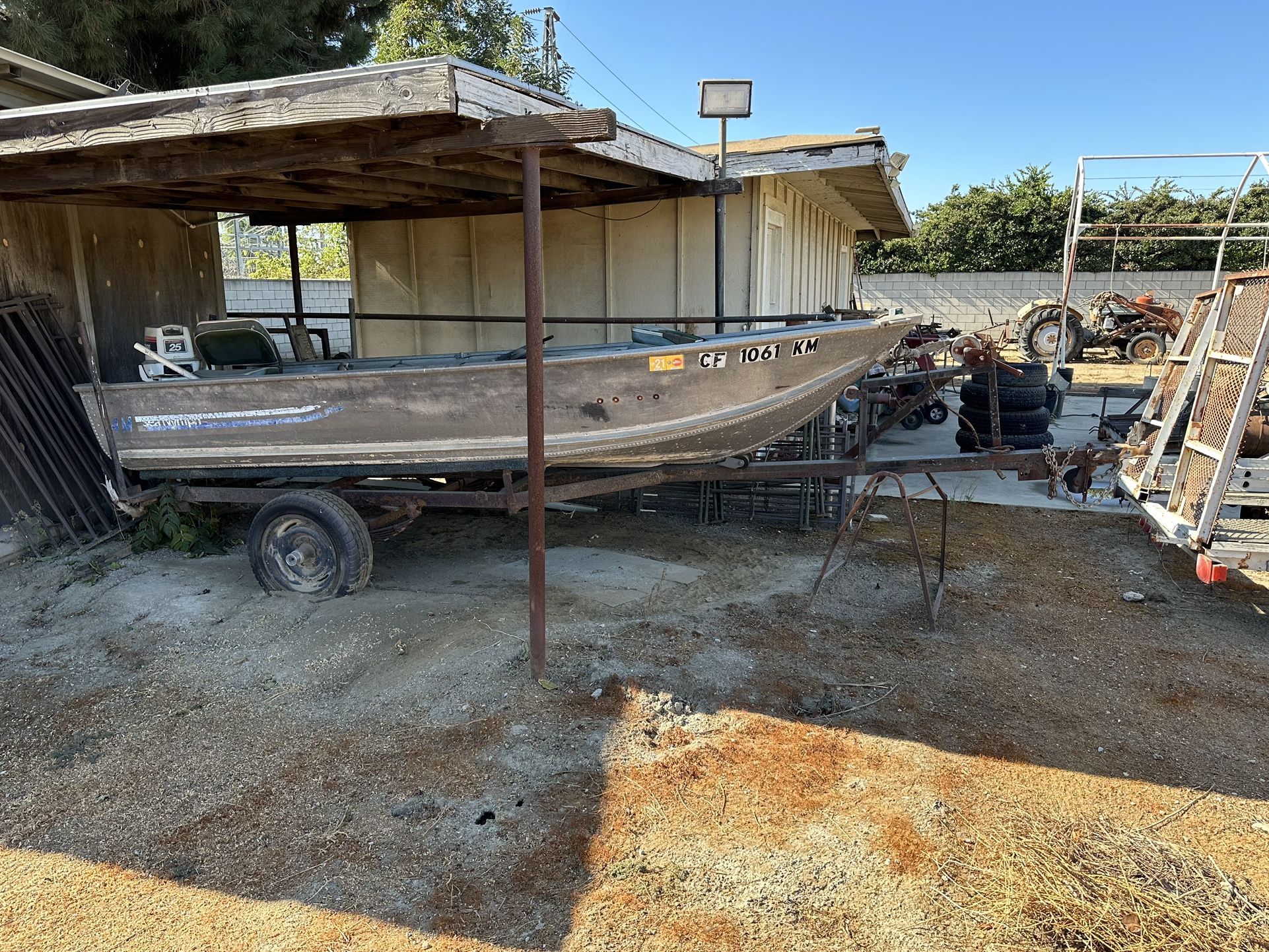 Small aluminum fishing boat w/trailer