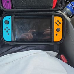 Nintendo Switch W/ TV Hook Up And Games