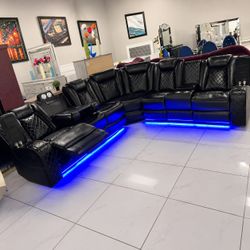 Black power reclining section sofa | delivery available