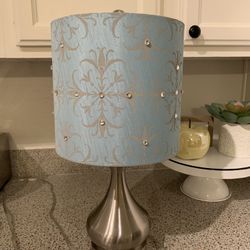 Small teal/turquoise lamp