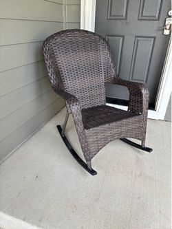 Large brown wicker outdoor chair