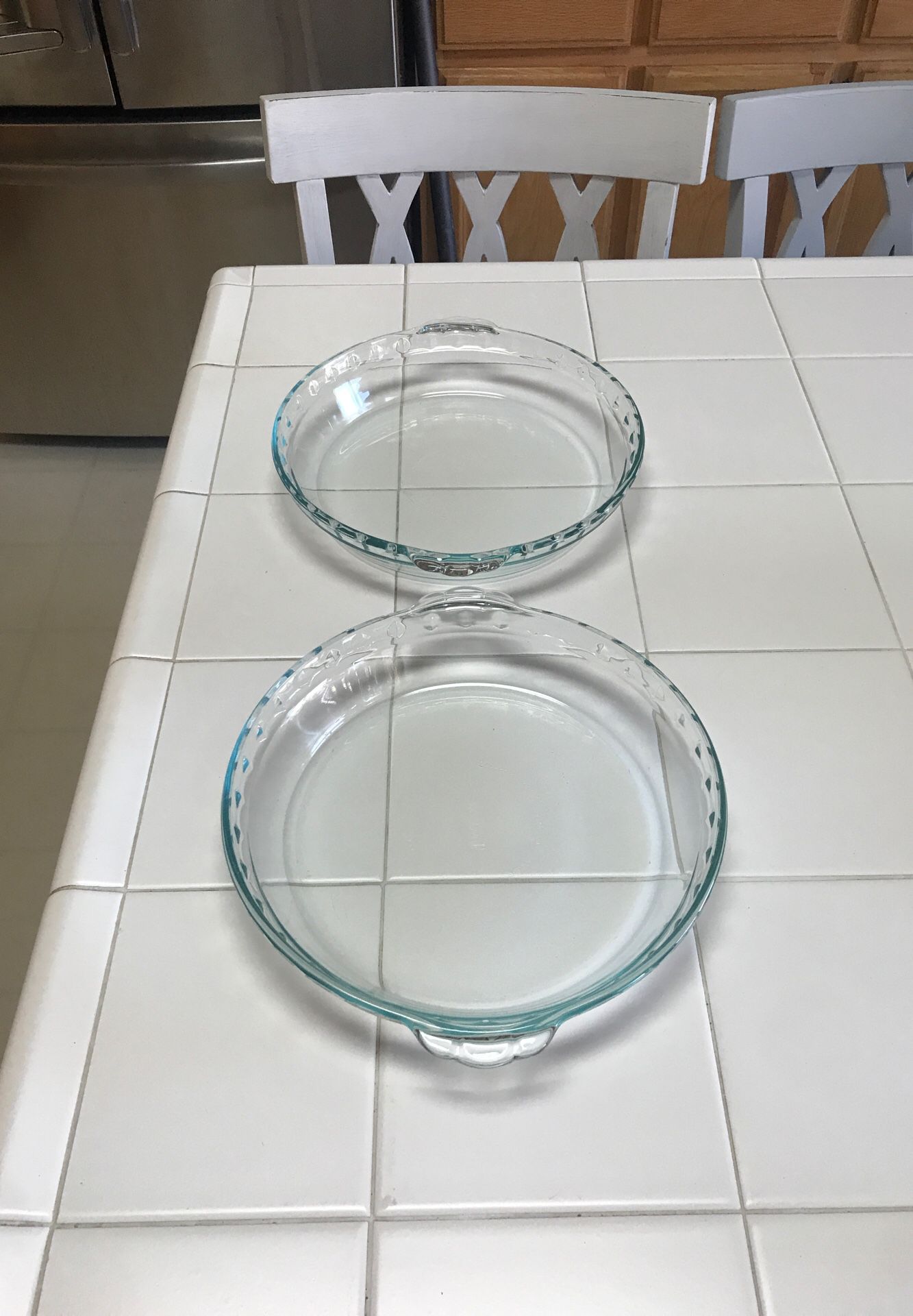 Two Pyrex pie dishes like new