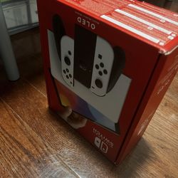 Nintendo Switch – OLED Model w/ White Joy-Con
