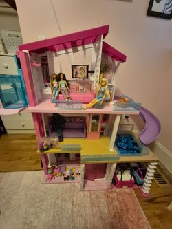 Barbie Dream house,  accessories, dolls, ect!