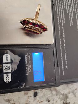 Gold ring 8 k yellow Garnet color stones 6.7 grams